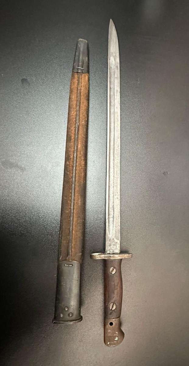 1907 Pattern bayonet with scabbard by Wilkinson. Still good condition.