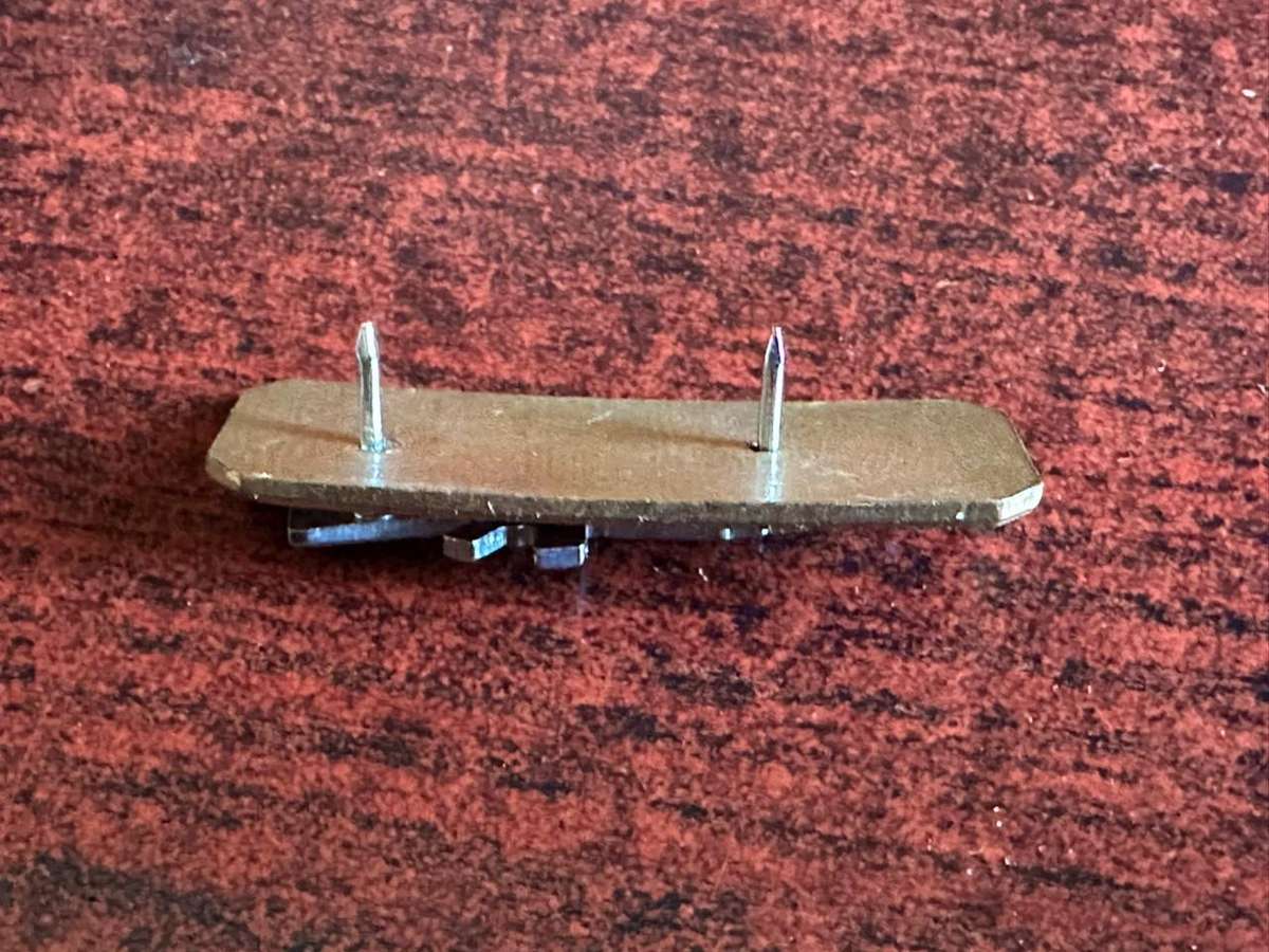 SADF Sharpshooter breast badge,chrome rifle on enamel backing. 2 Piece with 2 pins