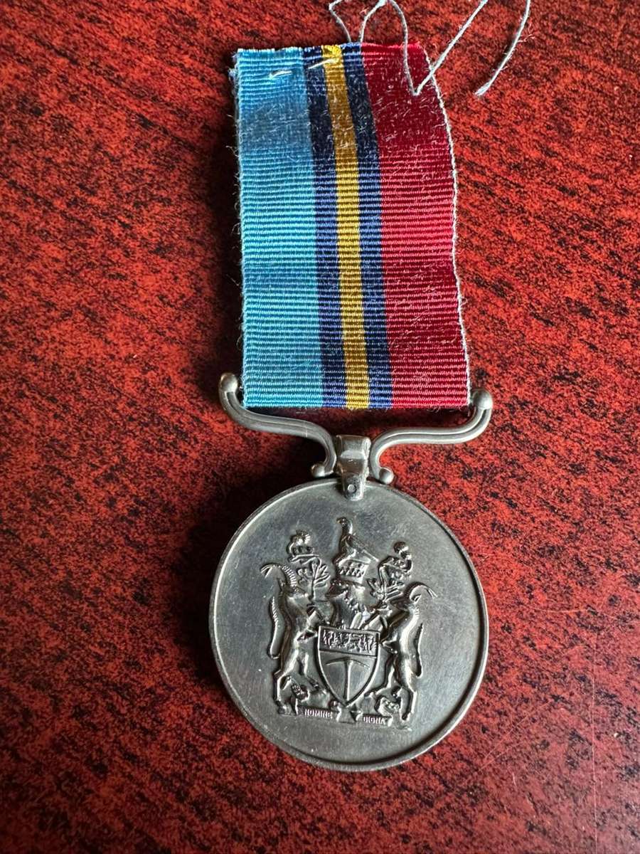 Rhodesia GSM awarded to PR 37729 Rfn. M.R. Wright.
