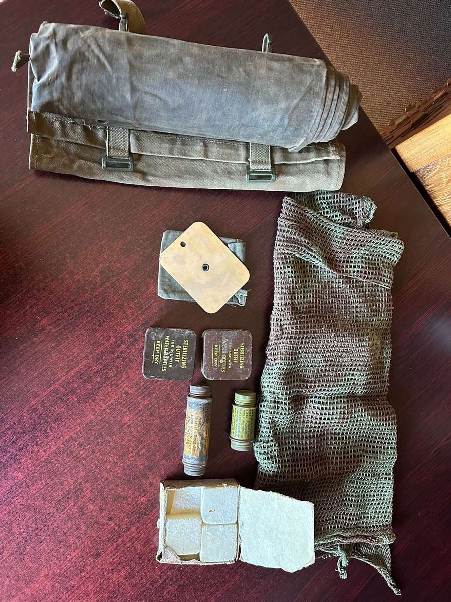 Rhodesian selection of items,sold together. Groundsheet with cover, mirror with holder,scarce fireli
