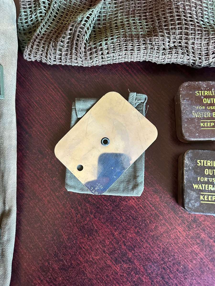 Rhodesian selection of items,sold together. Groundsheet with cover, mirror with holder,scarce fireli