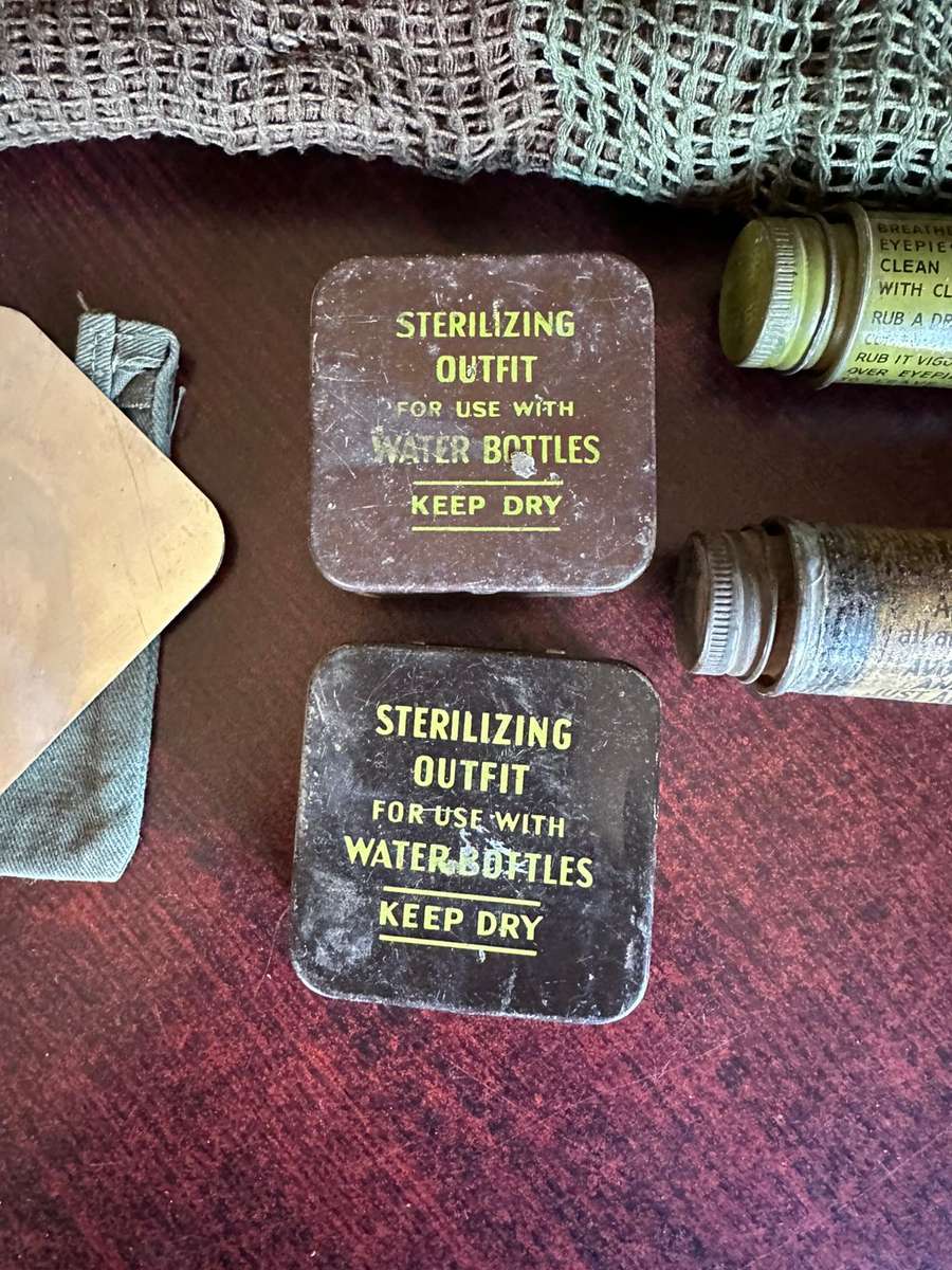 Rhodesian selection of items,sold together. Groundsheet with cover, mirror with holder,scarce fireli