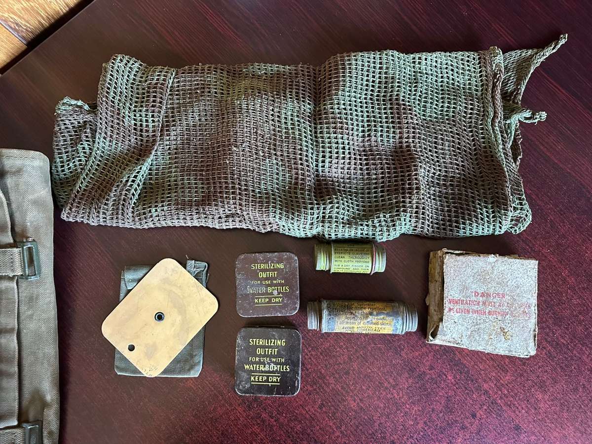 Rhodesian selection of items,sold together. Groundsheet with cover, mirror with holder,scarce fireli