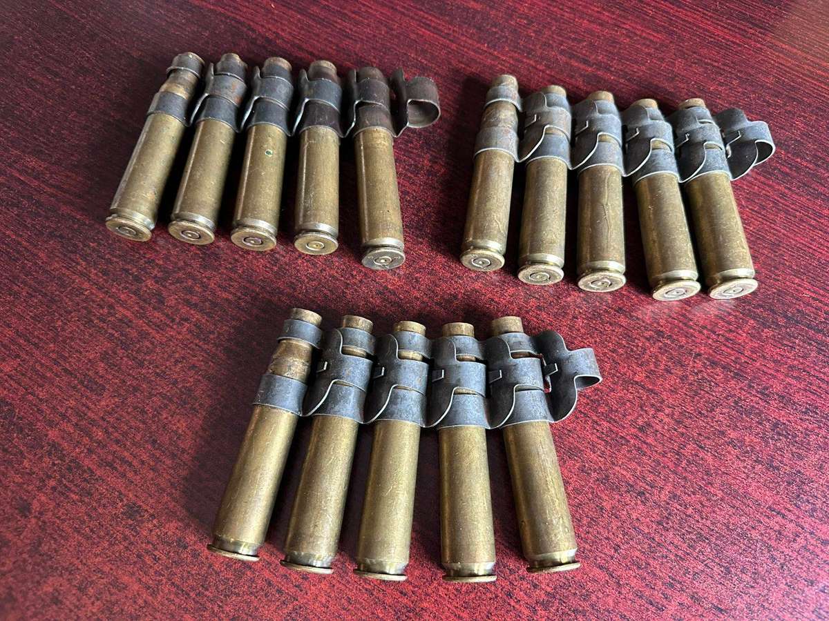 12,7 M4 machine gun belts. 3 Pieces with spent cartridges.