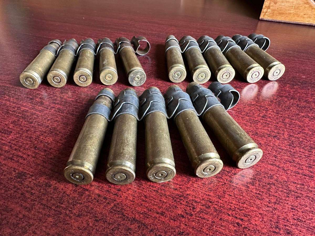 12,7 M4 machine gun belts. 3 Pieces with spent cartridges.