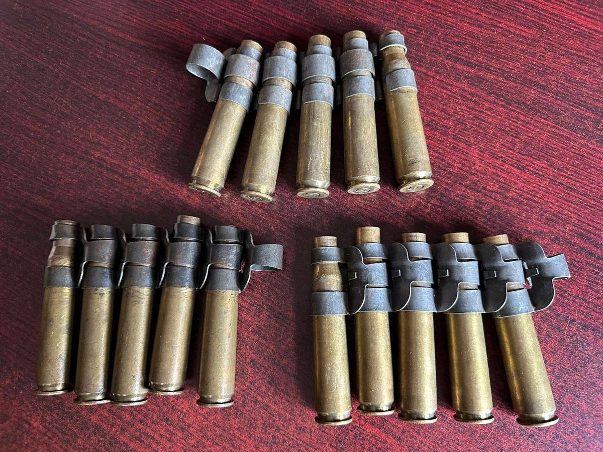 12,7 M4 machine gun belts. 3 Pieces with spent cartridges.