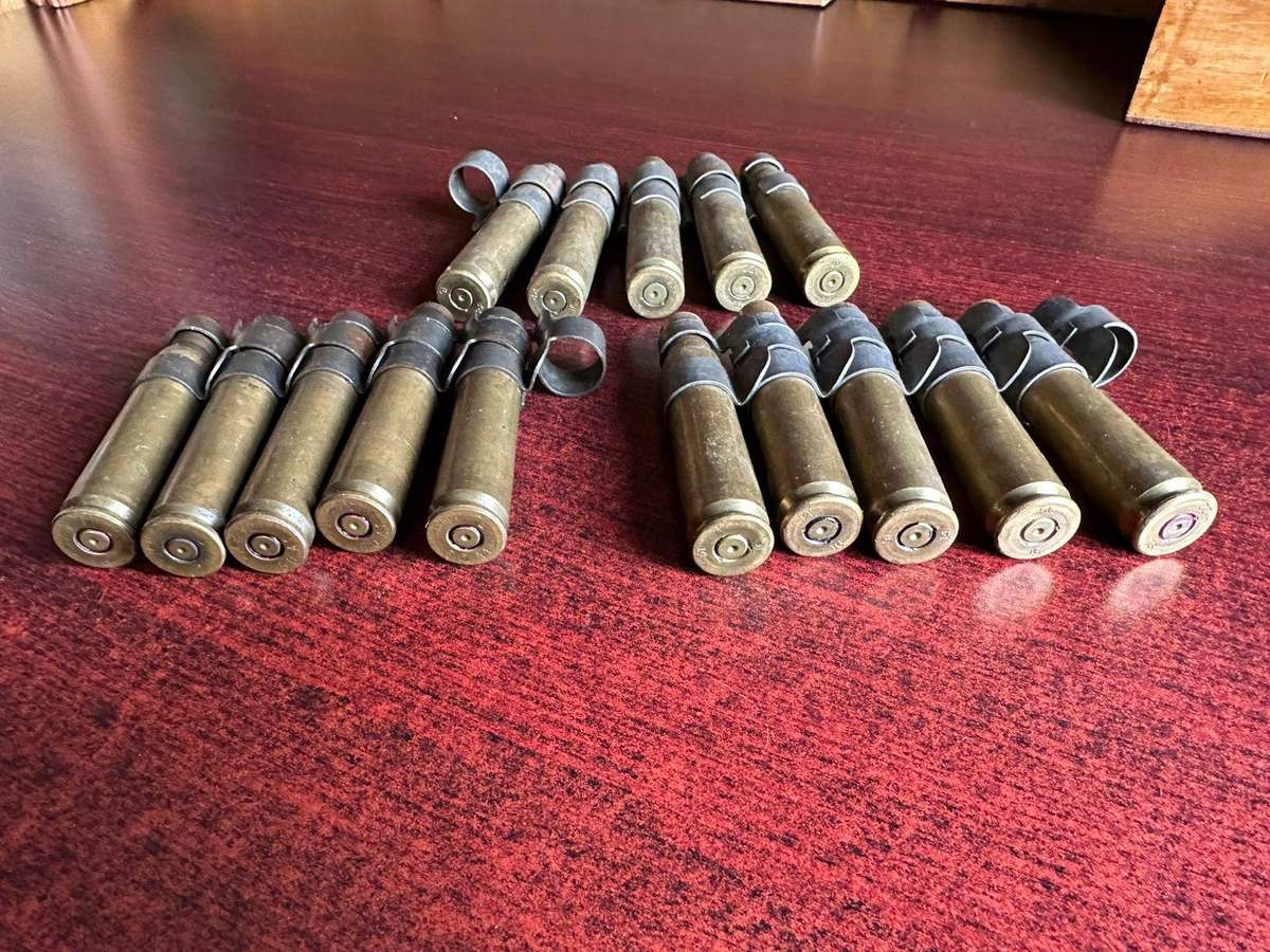 12,7 M4 machine gun belts. 3 Pieces with spent cartridges.