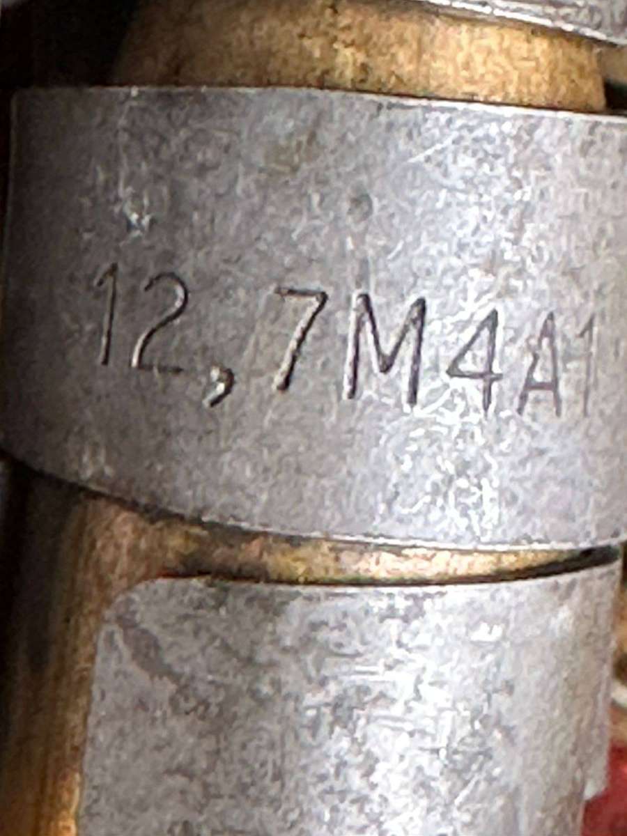 12,7 M4 machine gun belts. 3 Pieces with spent cartridges.