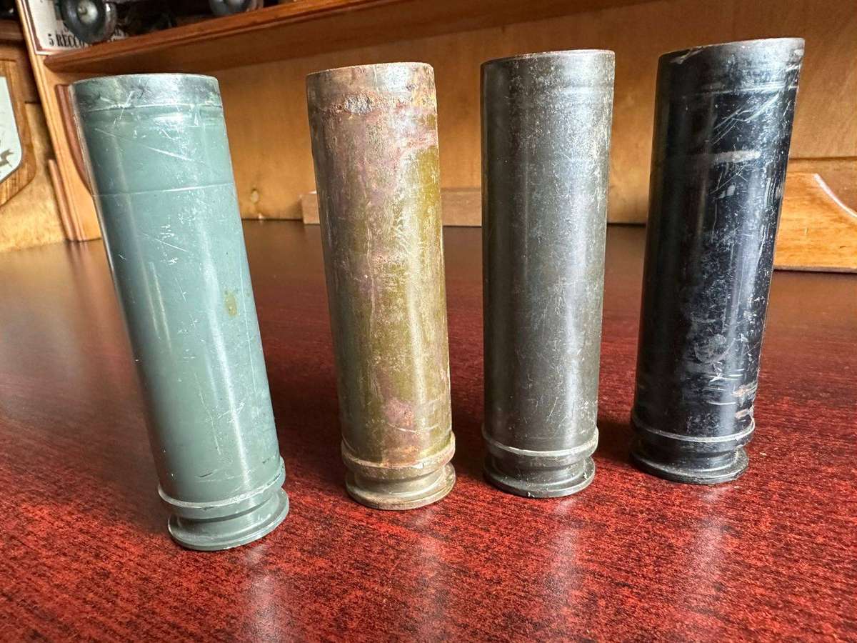 30mm. Spent cartridges. 4 Sold together. Length 11cm.