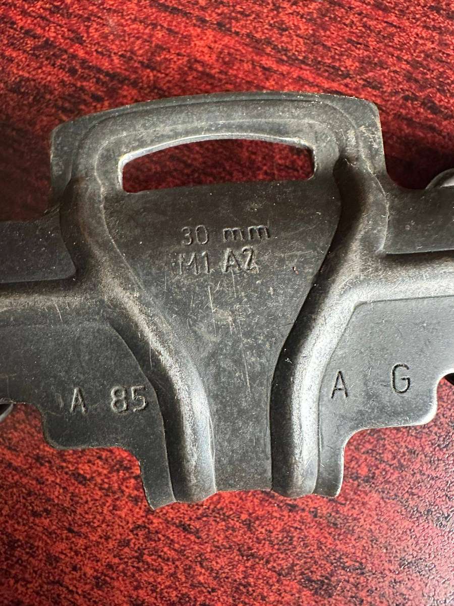 Selection of 7 30mm R1 A2 machine gun belt clips.