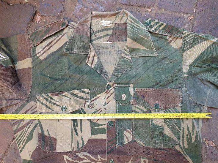 Original Rhodesian long sleeve camo shirt with Sgt. rank and custom added "pocket knife" pouch. No d