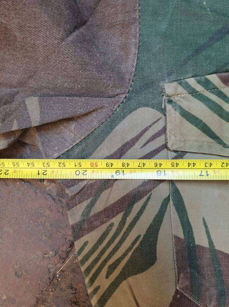 Original Rhodesian long sleeve camo shirt with Sgt. rank and custom added "pocket knife" pouch. No d