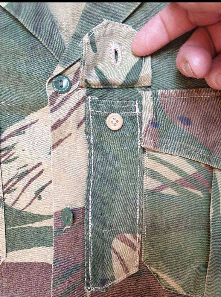 Original Rhodesian long sleeve camo shirt with Sgt. rank and custom added "pocket knife" pouch. No d