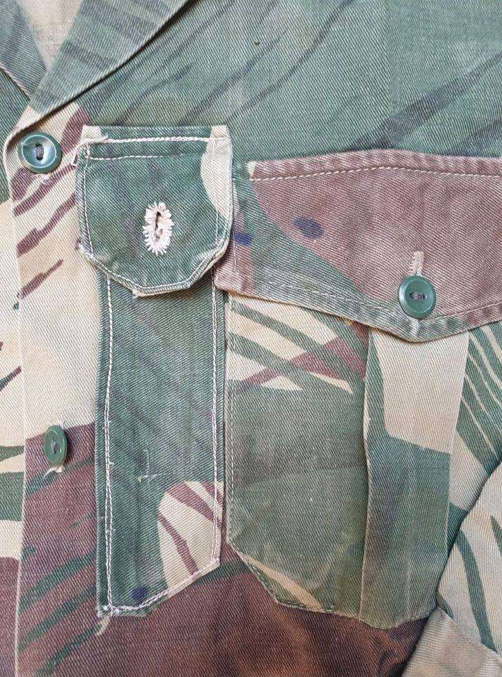Original Rhodesian long sleeve camo shirt with Sgt. rank and custom added "pocket knife" pouch. No d