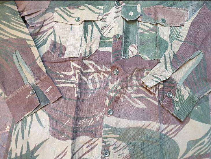Original Rhodesian long sleeve camo shirt with Sgt. rank and custom added "pocket knife" pouch. No d