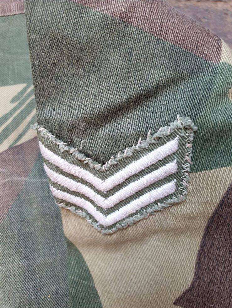 Original Rhodesian long sleeve camo shirt with Sgt. rank and custom added "pocket knife" pouch. No d