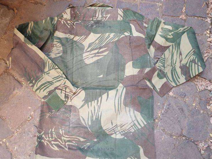 Original Rhodesian long sleeve camo shirt with Sgt. rank and custom added "pocket knife" pouch. No d