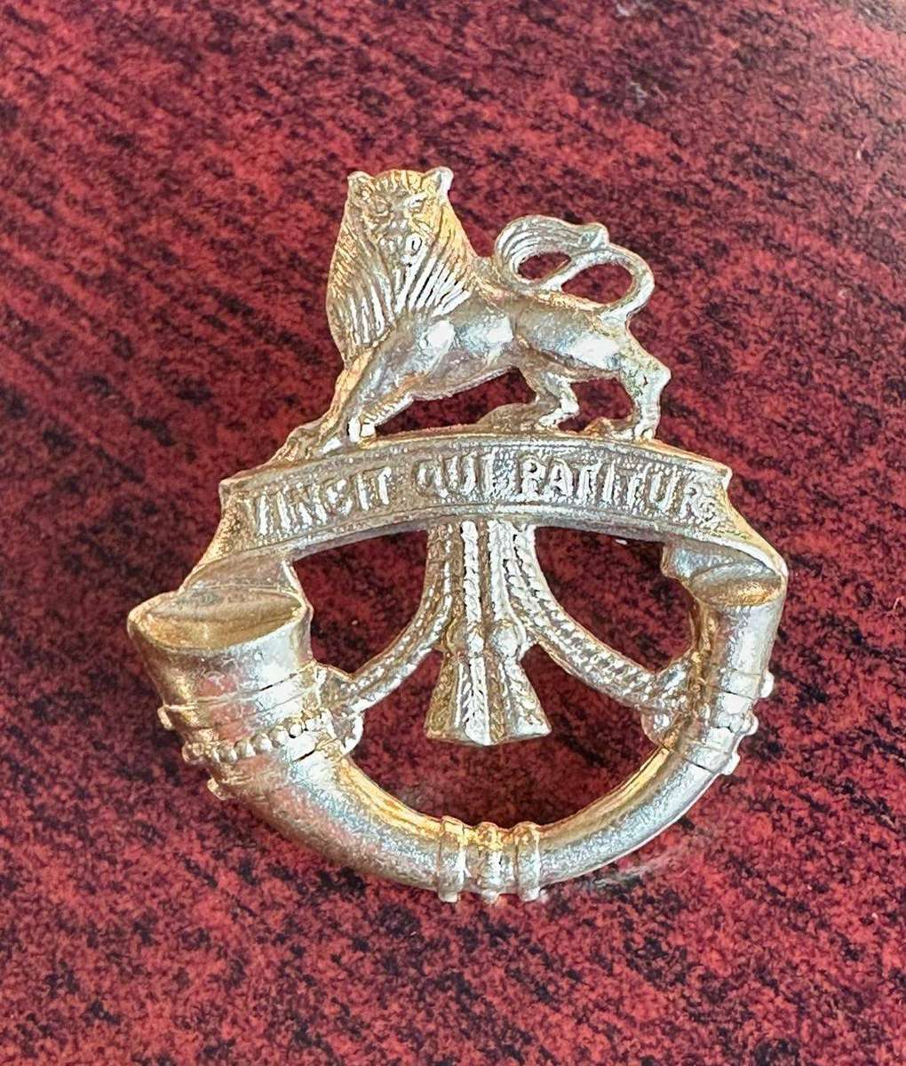 Rand Light Infantry gilding metal cap badge. This badge was struck, but never worn. 2 Lugs