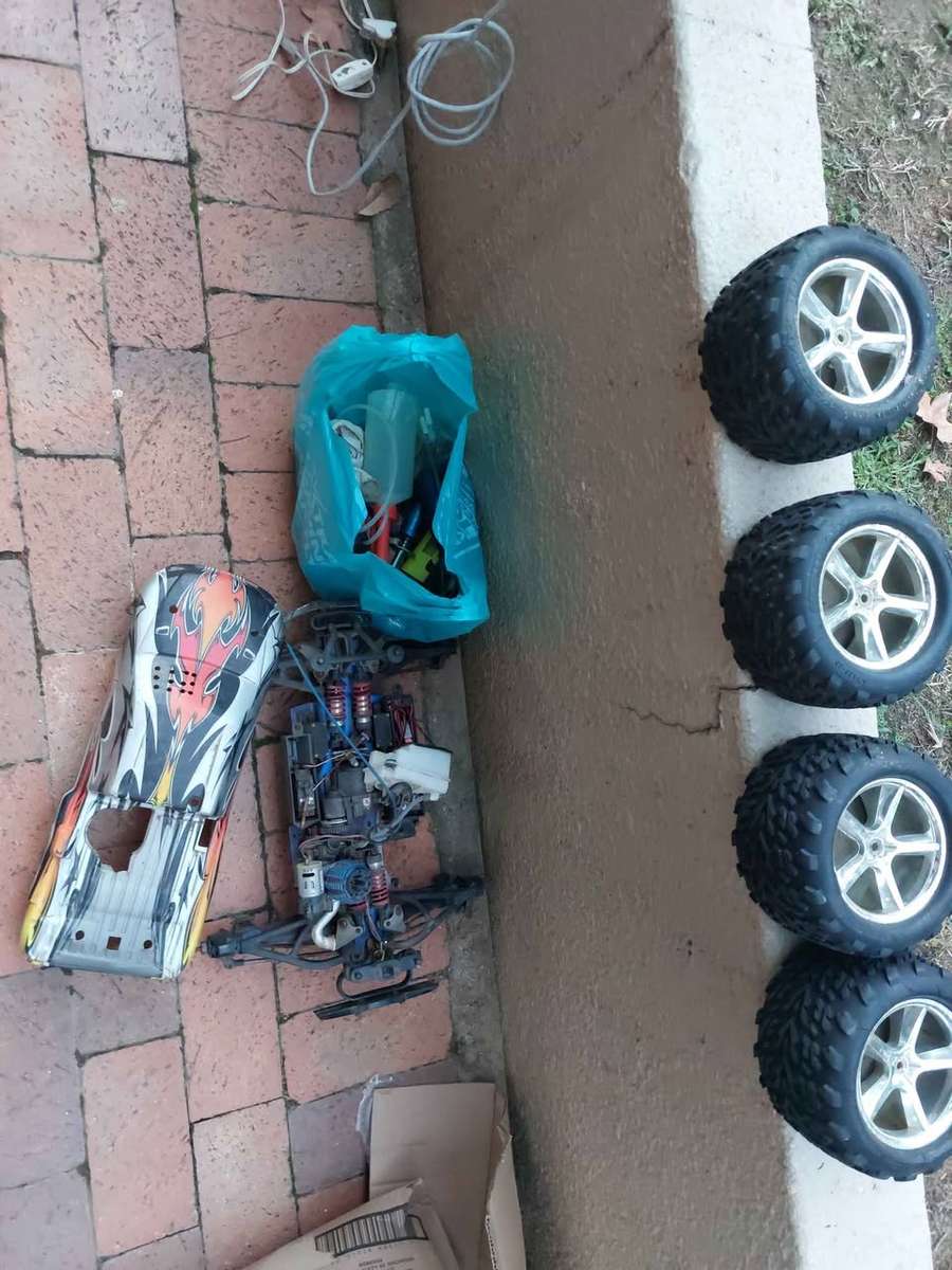 Radio Control car and 4 tyres for spares, and other accessories