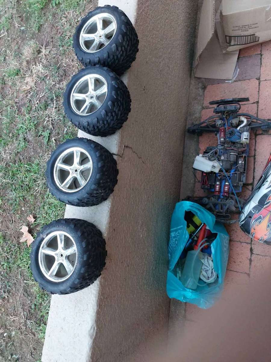 Radio Control car and 4 tyres for spares, and other accessories