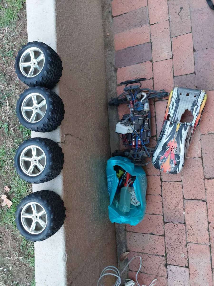 Radio Control car and 4 tyres for spares, and other accessories