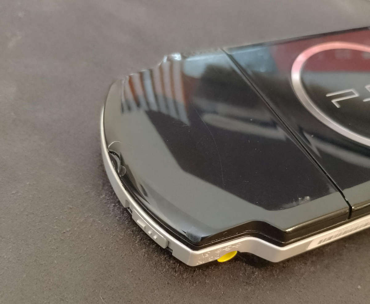 PSP Slim 3004 + 8 Games