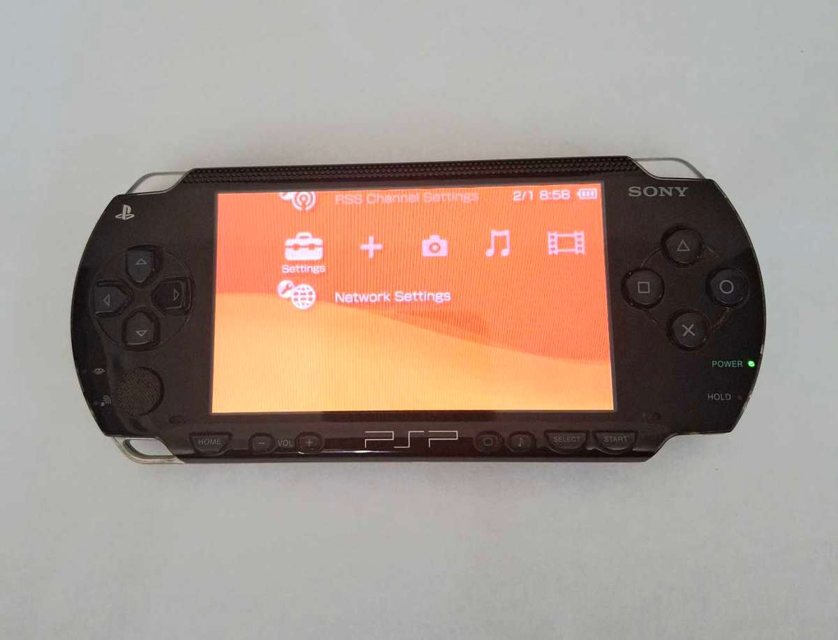 PSP 1000 PHAT + 4 Games