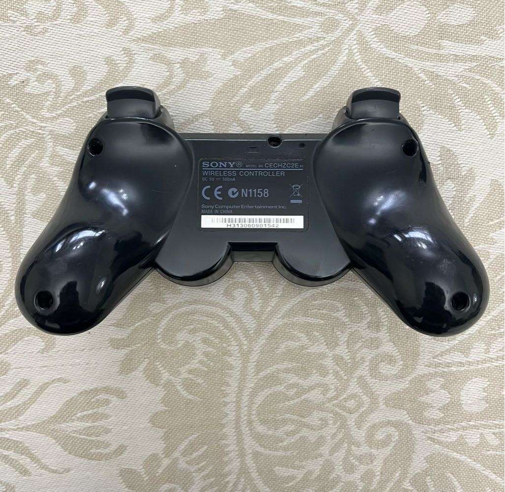 PS3 Slim (320GB) + 1 Game