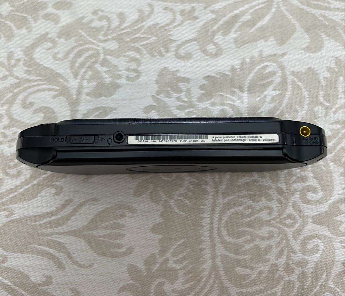 PSP Street E1004 (Black) + 4 Games