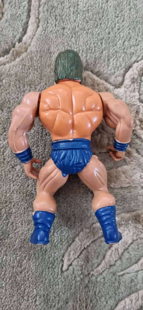 Vintage WWE MOTU KO figure