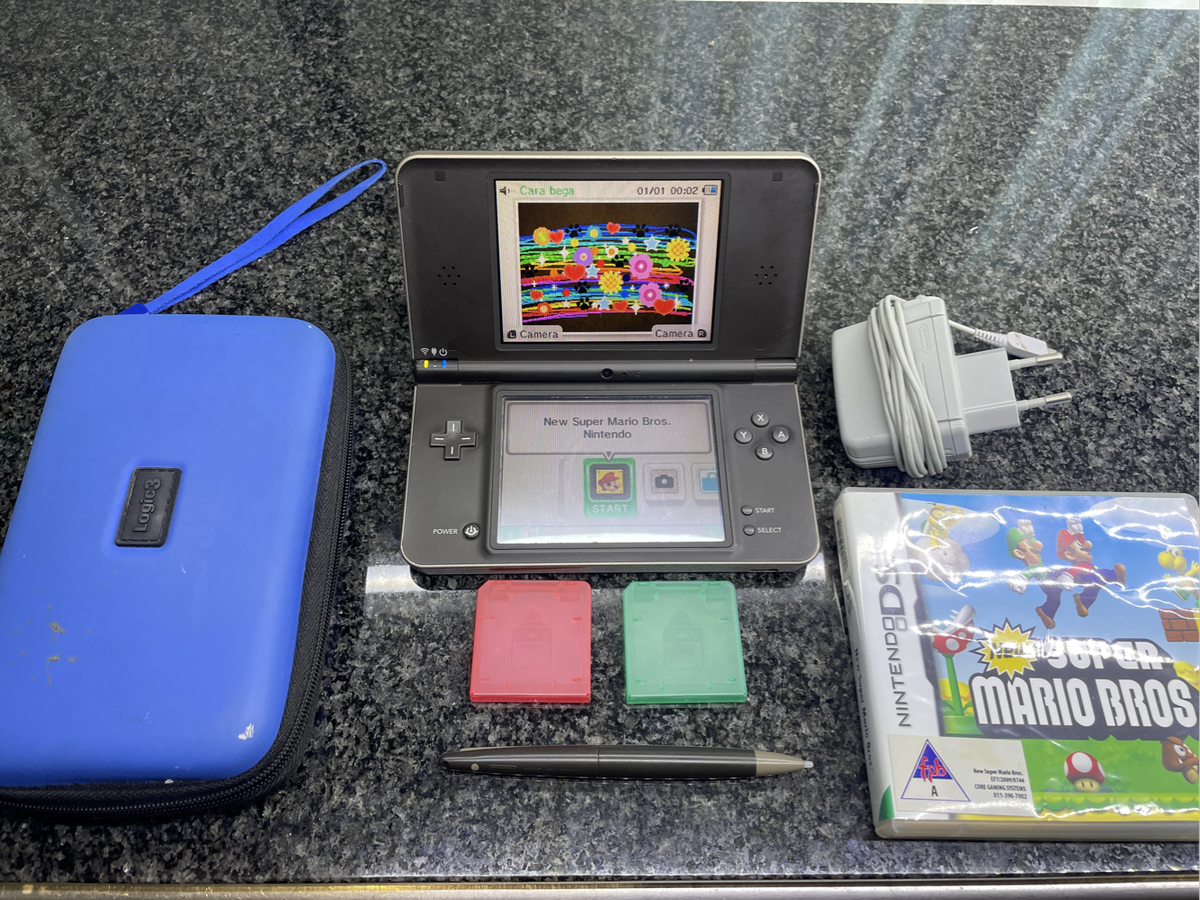Nintendo DSi XL With Accessories