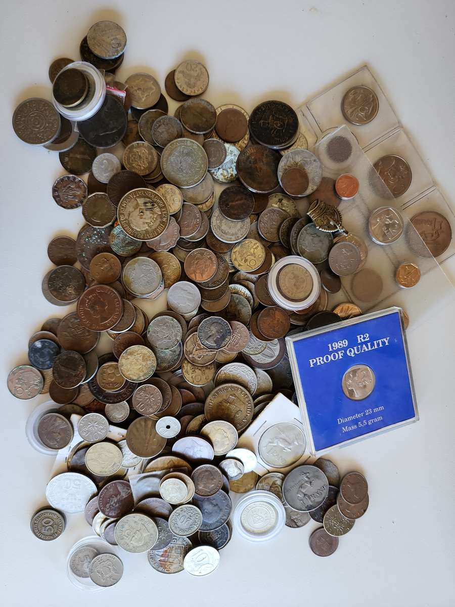 Unsorted mixed world coins, medals, tokens etc.