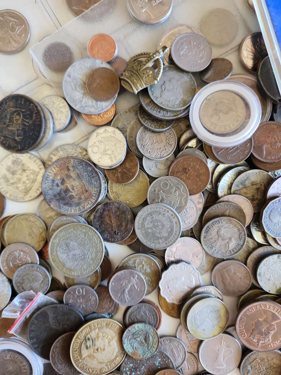 Unsorted mixed world coins, medals, tokens etc.