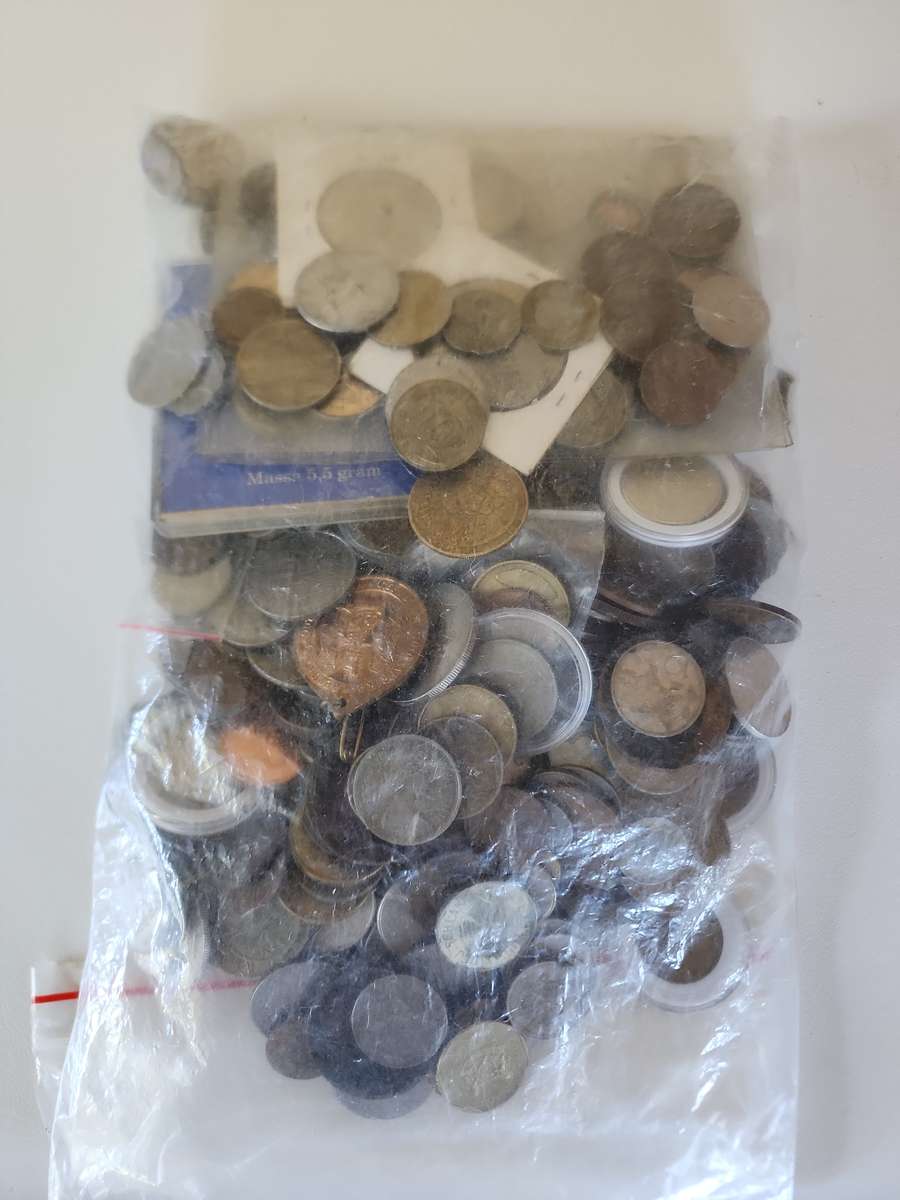 Unsorted mixed world coins, medals, tokens etc.