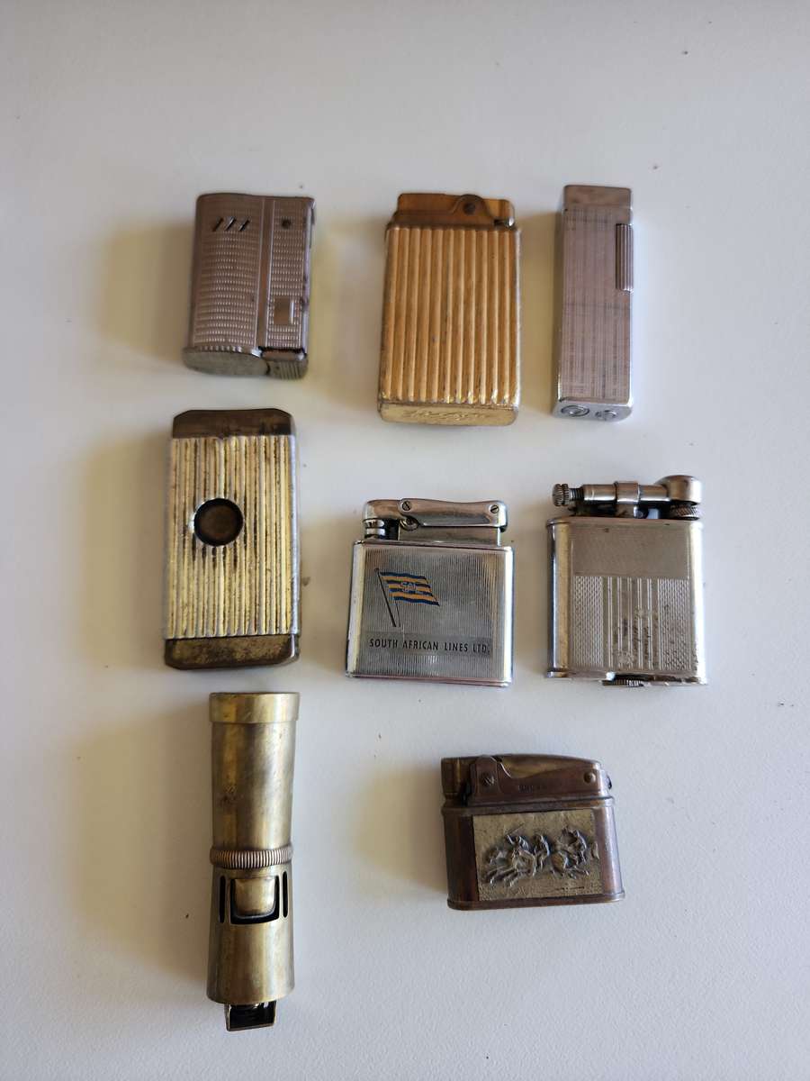 Collection of vintage lighters x 8