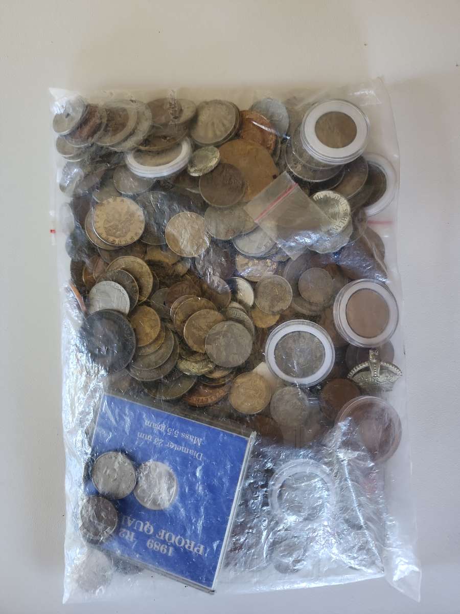 Unsorted mixed world coins, medals, tokens etc.