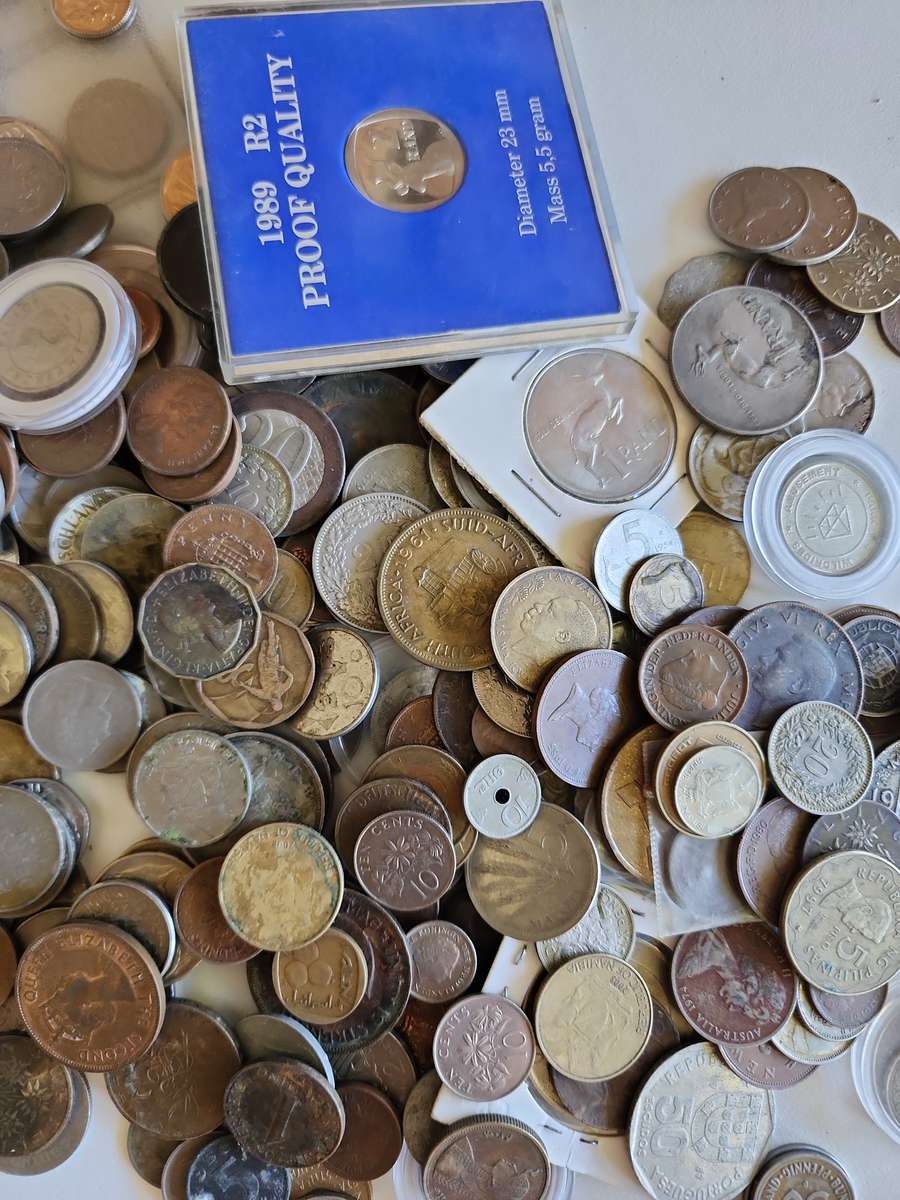 Unsorted mixed world coins, medals, tokens etc.