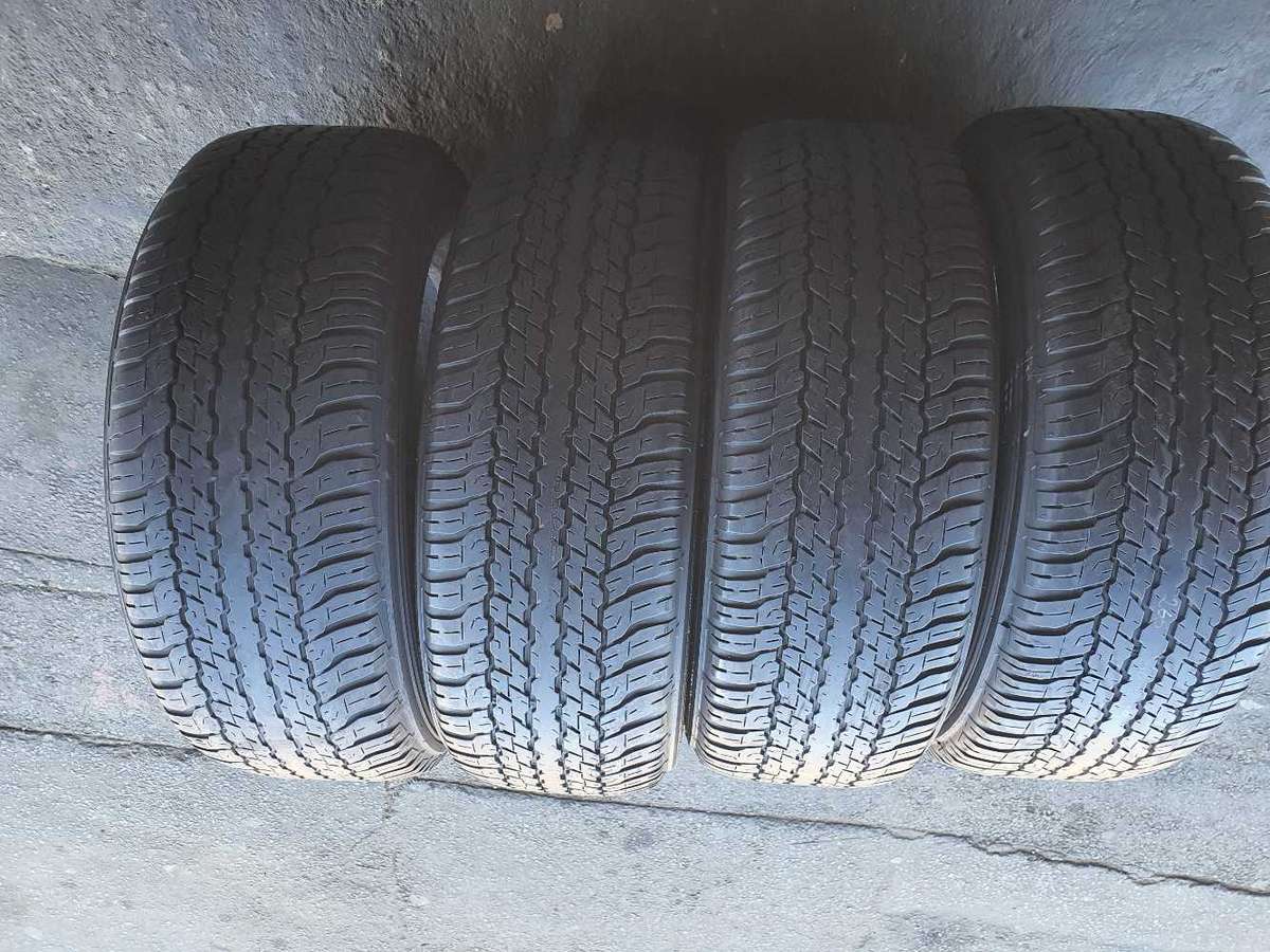 265/60/18 x 4 Dunlop Grandtrak AT. 70% thread life