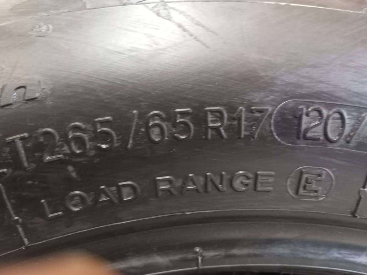 4 x 265/65/17 BF Goodrich AT Tyres.