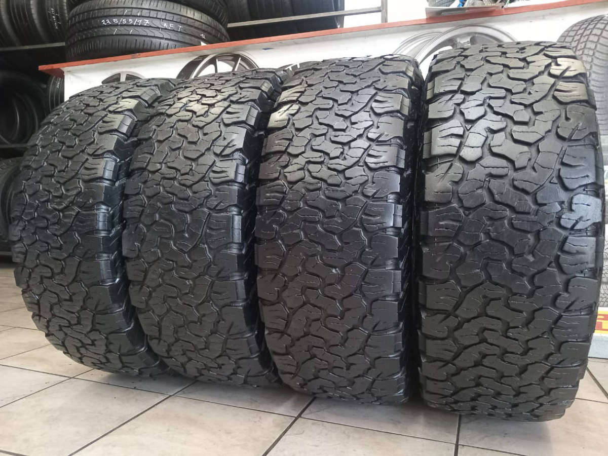 4 x 265/65/17 BF Goodrich AT Tyres.