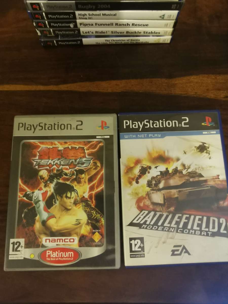 Massive Collection of PlayStation 2 Games with a Memory Card and Original Remote