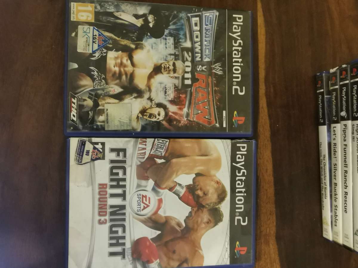 Massive Collection of PlayStation 2 Games with a Memory Card and Original Remote