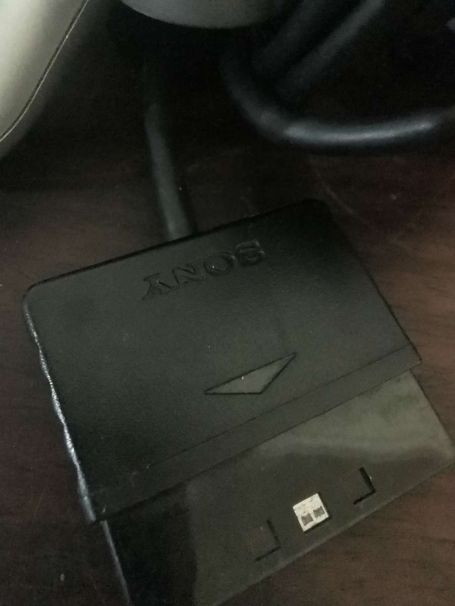 Silver PlayStation 2 Console Complete with x7 Free Games