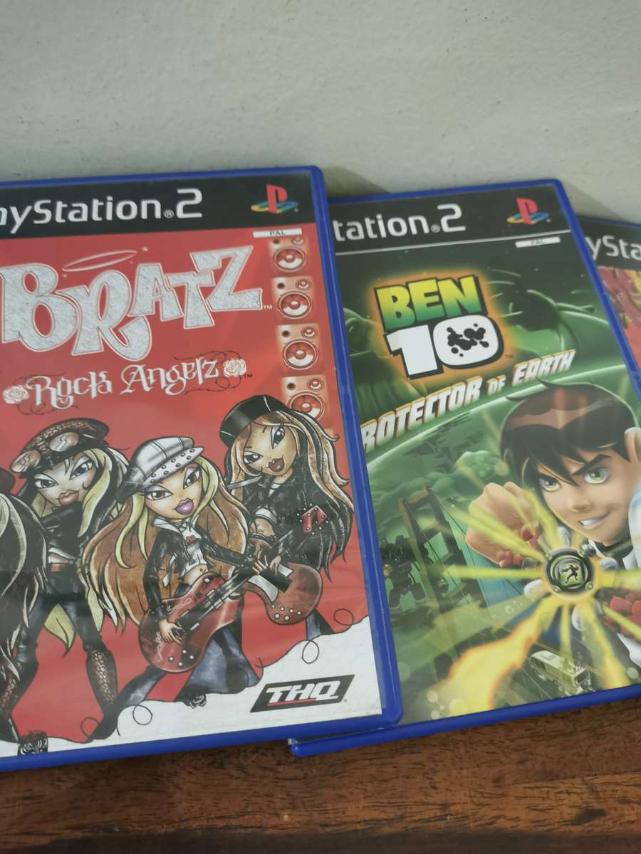 Silver PlayStation 2 Console Complete with x7 Free Games