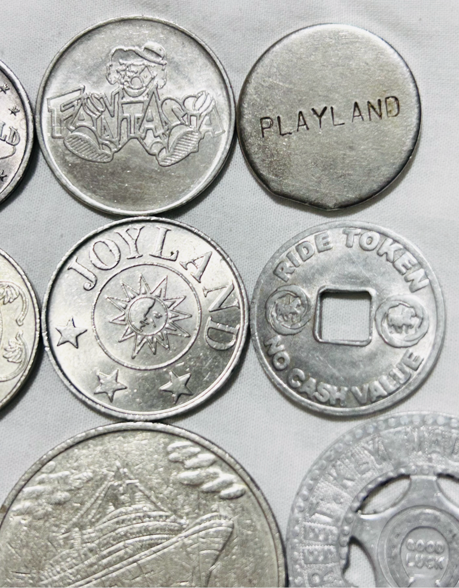 Twelve x Casino tokens all different as one lot Relict non payment.