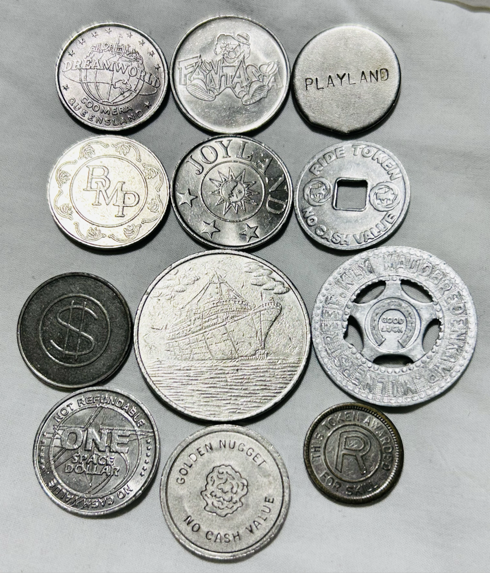 Twelve x Casino tokens all different as one lot Relict non payment.