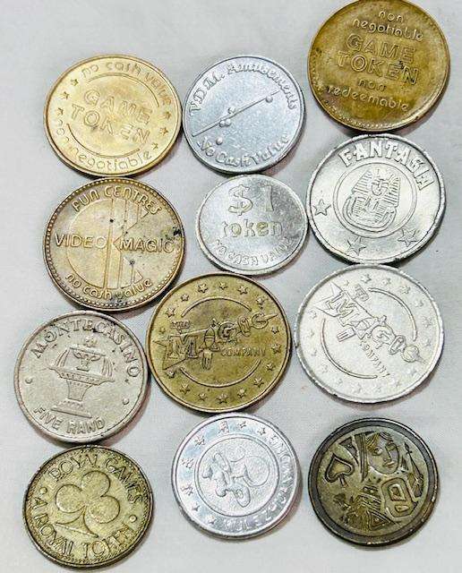 CASINO MIX LOT OF (12) TOKENS FROM ALL OVER THE WORLD