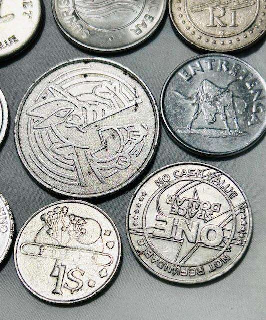 Machine token mix lot (12) tokens over the world- Pokeman token included