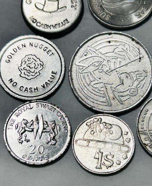 Machine token mix lot (12) tokens over the world- Pokeman token included