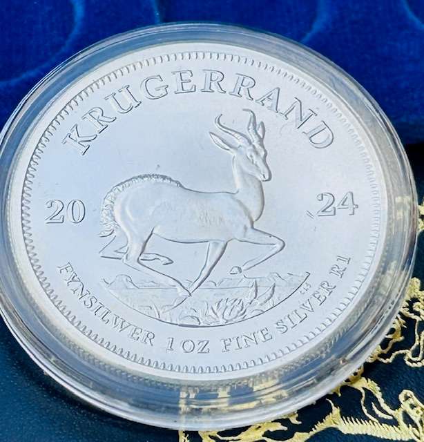 2024 KRUGERRAND 1OZ FINE SILVER IN CAPTULE AND LEATHER COIN POUCH SPOTLESS COIN TO GRADE SEE IMAGES